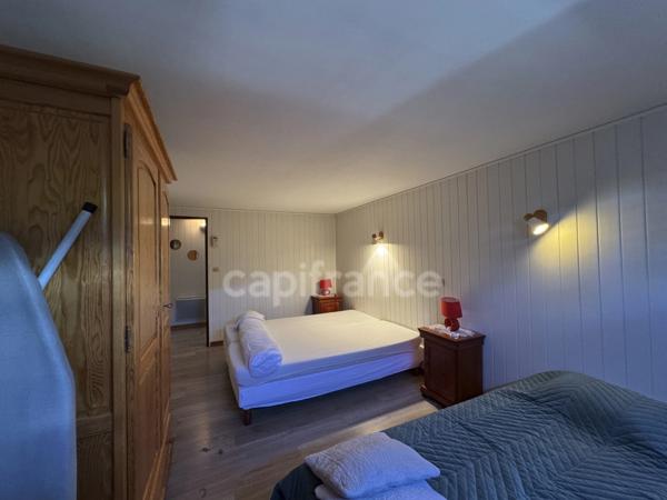 DOUSSARD Terrain 2024m² divisble constructible avec maison construite