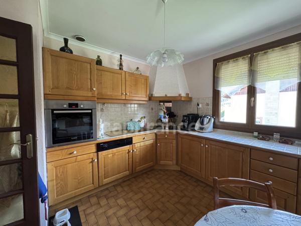 DOUSSARD Terrain 2024m² divisble constructible avec maison construite