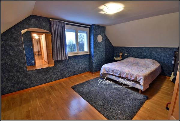 Maison familiale de 142 m² avec 4 chambres et sous-sol total, DPE D