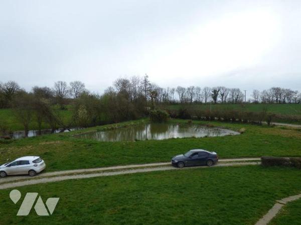 Maison en parpaings sous ardoises, comprenant :
Au sous-sol : garage, chaufferie, buanderie
A...