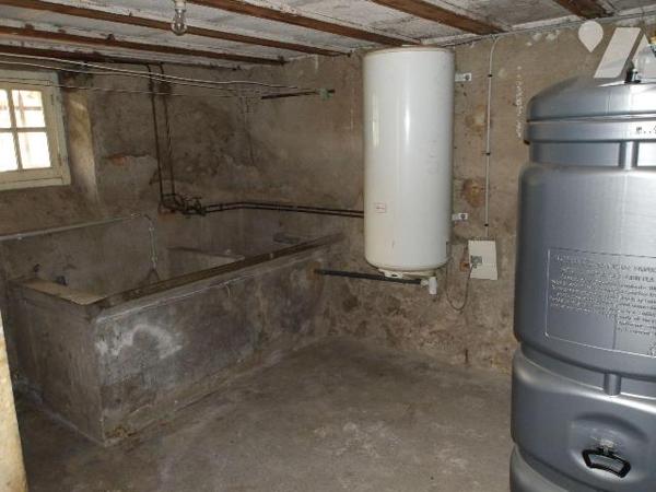 A BOUSSAC (23) CREUSE, maison de caractère élevée sur garage, cave et buanderie/chaufferie d'un...