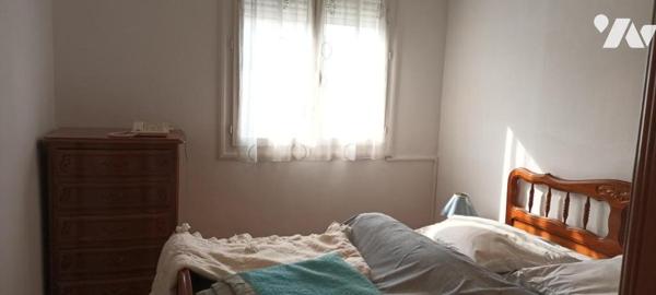 Appartement T3 avec balcon et parking privé