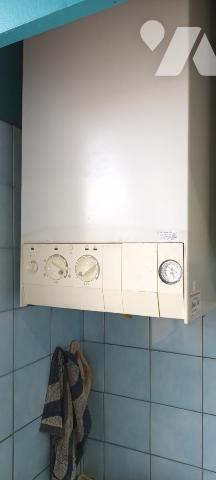 Appartement T3 avec balcon et parking privé