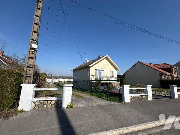 Dans un environnement paisible, découvrez en exclusivité cette maison individuelle à rénover,