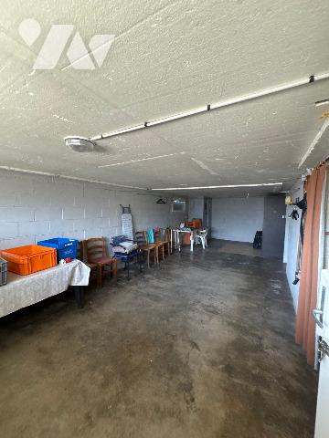 Dans un environnement paisible, découvrez en exclusivité cette maison individuelle à rénover,