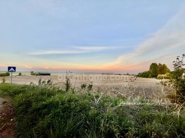 MONTJAVOULT – TERRAIN À BÂTIR 1 131 M² – VUE DÉGAGÉE
