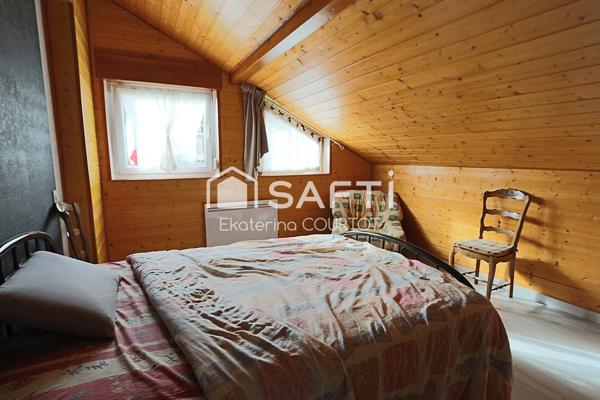 Élégant chalet en bois massif de 106 m² sur 25 ares