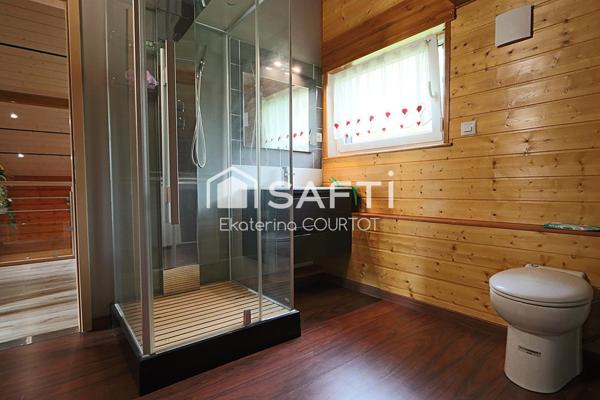 Élégant chalet en bois massif de 106 m² sur 25 ares