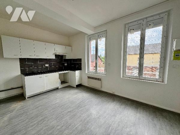 MAISON DE VILLE AVEC JARDIN