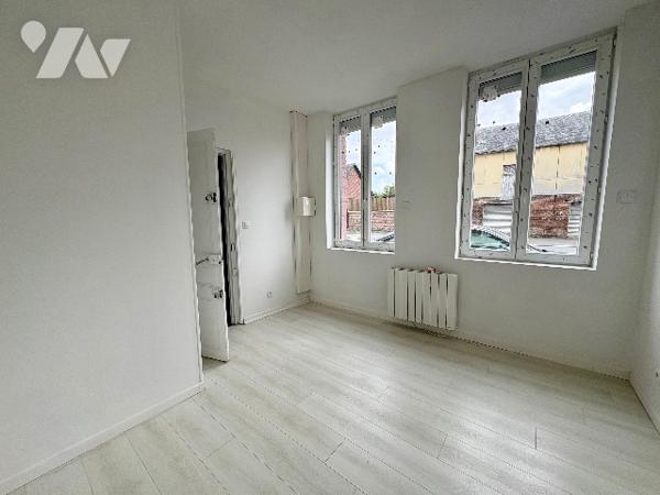 MAISON DE VILLE AVEC JARDIN