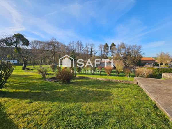Grande maison rénovée avec garage et jardin