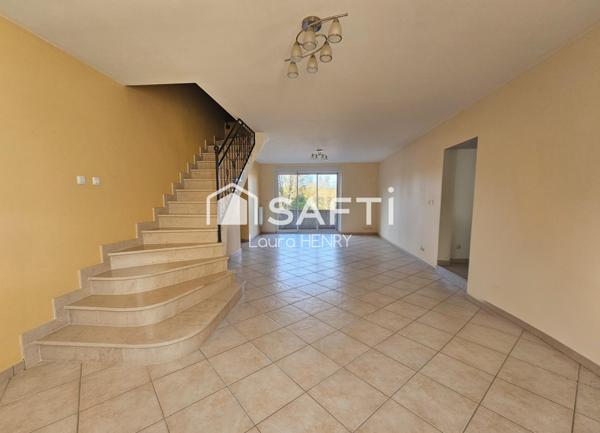 Grande maison rénovée avec garage et jardin