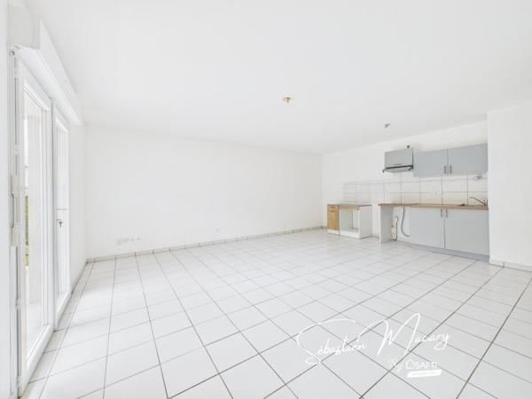 Appartement 3 pièces 68 m² avec terrasse et deux parkings