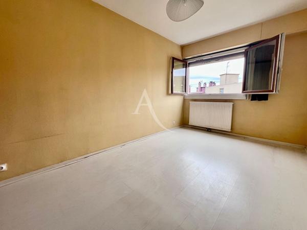 Centre ville Pau , appartement 3 chambres parking en sous sol et cave