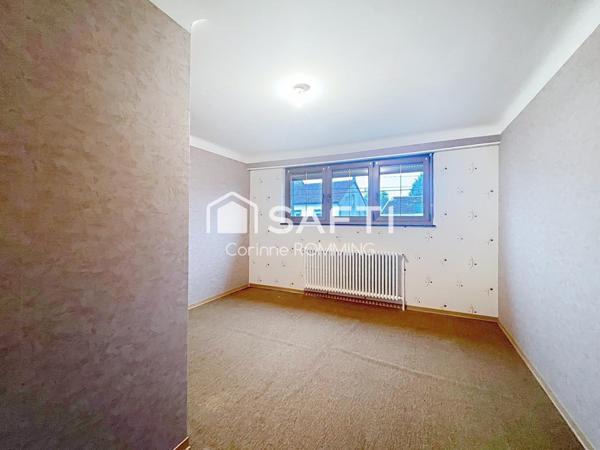 Maison individuelle avec 4 chambres sur terrain de 7,5 ares