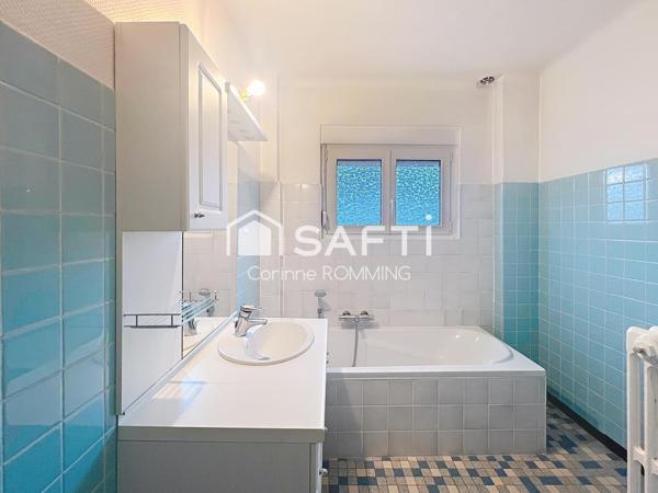 Maison individuelle avec 4 chambres sur terrain de 7,5 ares