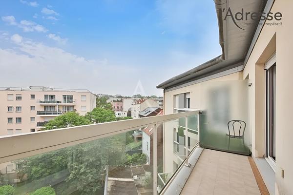 Appartement familial 4 pièces avec 2 balcons, 2 parkings et cave