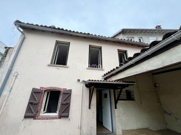 Maison spacieuse au cœur du centre – Gros potentiel à révéler