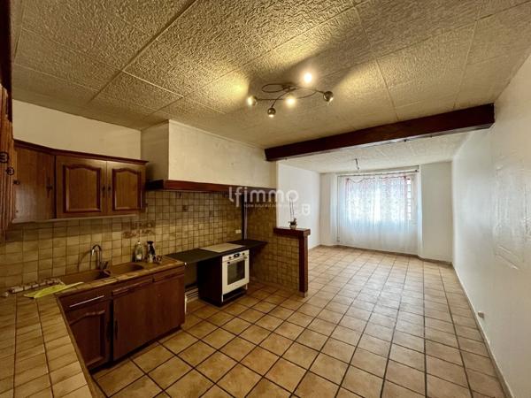 Maison spacieuse au cœur du centre – Gros potentiel à révéler