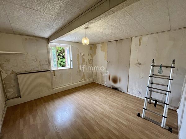 Maison spacieuse au cœur du centre – Gros potentiel à révéler