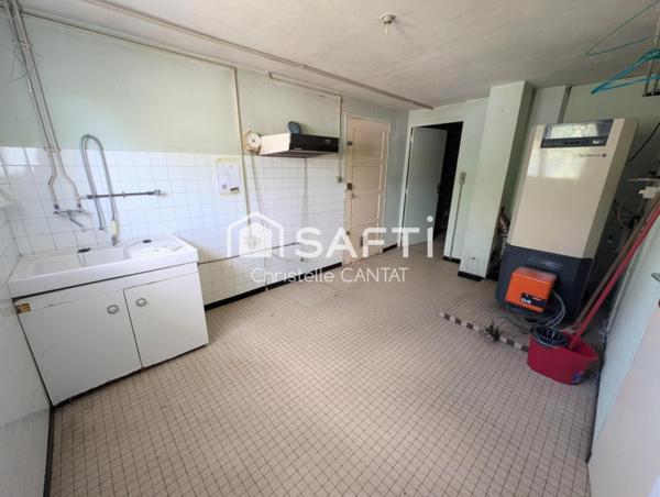 Maison 115 m², 4 chambres, garage et terrain