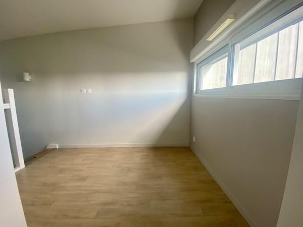 T3 BIS EN DUPLEX AVEC TERRASSE ET STATIONNEMENTS