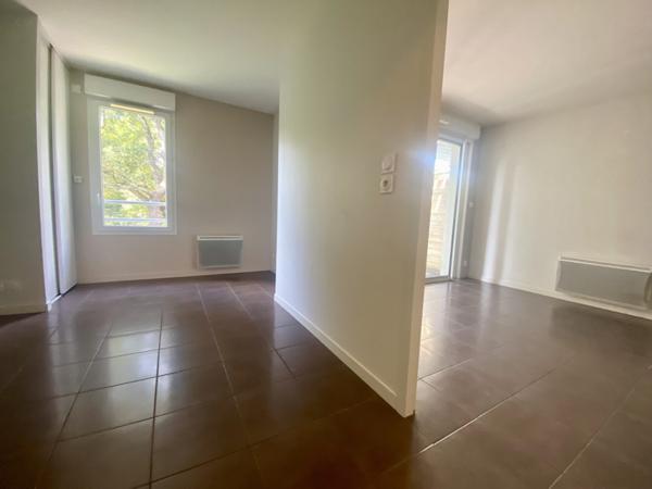 T3 BIS EN DUPLEX AVEC TERRASSE ET STATIONNEMENTS