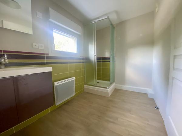 T3 BIS EN DUPLEX AVEC TERRASSE ET STATIONNEMENTS