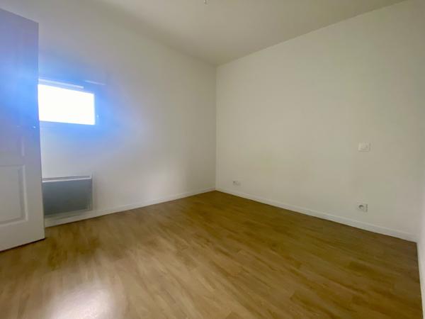 T3 BIS EN DUPLEX AVEC TERRASSE ET STATIONNEMENTS