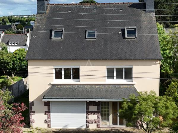 Maison familiale avec ascenseur et jardin