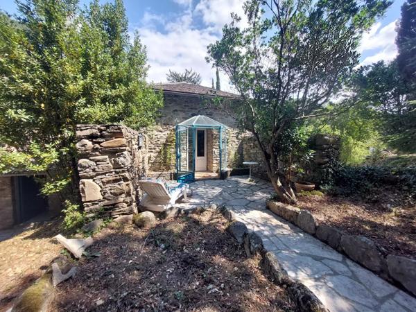 Mas en pierre en Cévennes avec 7ht de terrain garage et piscine vue panoramique