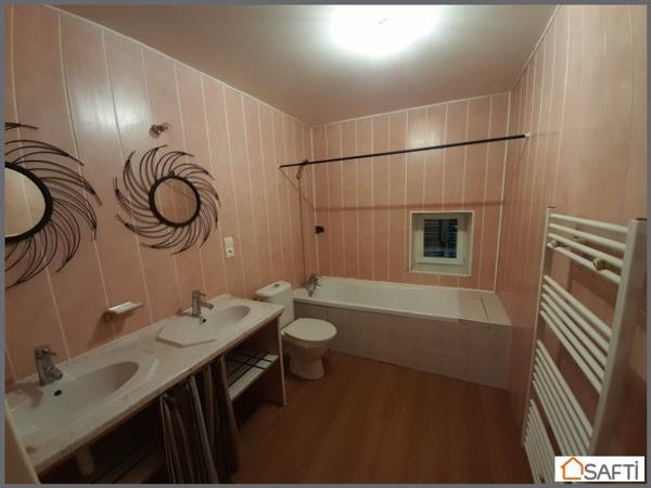 Maison composée de 2 logements, 7 pièces, 5 chambres