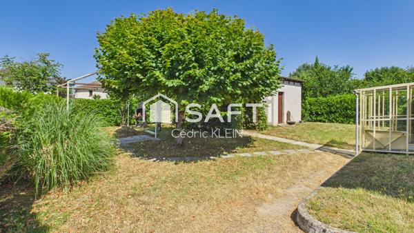 Maison sur sous sol avec joli terrain