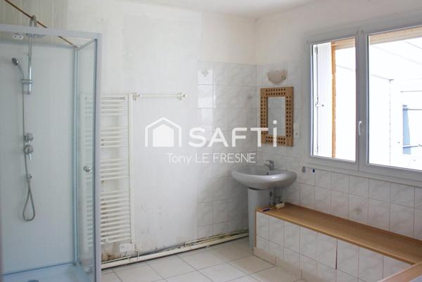 Belle maison avec ses 3 chambres et son beau terrain cloturé