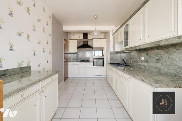 Appartement F4 avec garage 