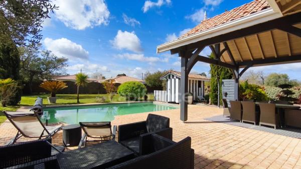 Maison familiale avec piscine sur terrain de 1280 m² SANGUINET