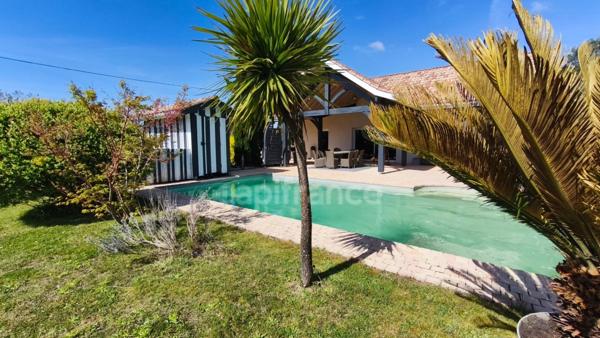 Maison familiale avec piscine sur terrain de 1280 m² SANGUINET