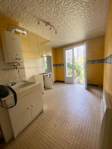 Immeuble Oloron Sainte Marie 2 appartements 2 Garages avec jardin