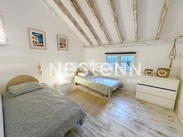 Ensemble immobilier avec deux cabanes de gardians sur parc de 1,17 ha avec piscine