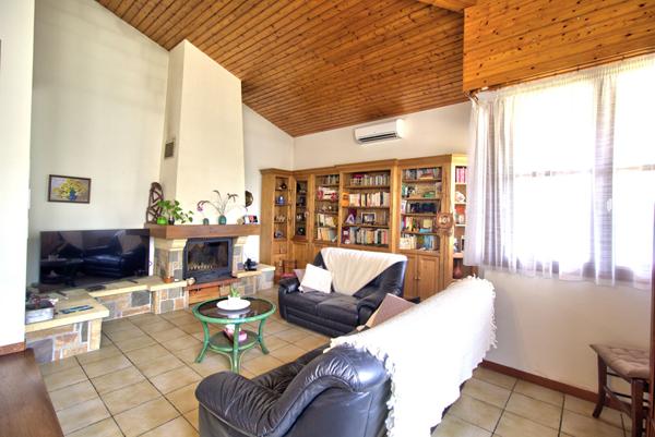 LE PASSAGE - Maison de plain-pied de 125m² habitables avec 3 chambres, 1 bureau, garage et terrain clos de 730m².