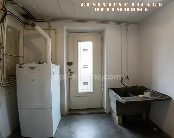 Centre-ville de Pontivy – Maison de 4 pièces avec sous-sol sur 1 500 m² de jardin paysagé en zone UB : un potentiel rare qui fait la différence !