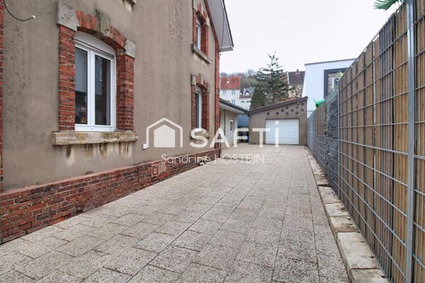 Maison libre 3 côtés avec terrasse, jardin et grand garage!