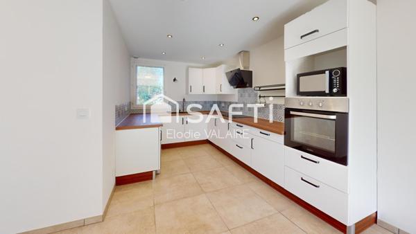 Maison mitoyenne à étage de 71 m²  2 chambres + Bureau  avec jardin et  garage