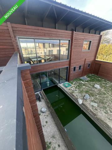 Immeuble de bureaux à vendre à Montélier avec vaste parking extérieur