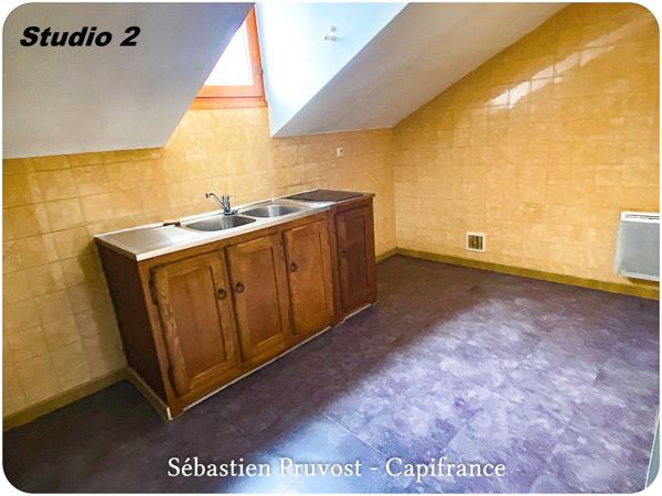 Immeuble à vendre PERIGUEUX (24), immeuble de rapport, un F3, deux F2, deux studios et un bureau.