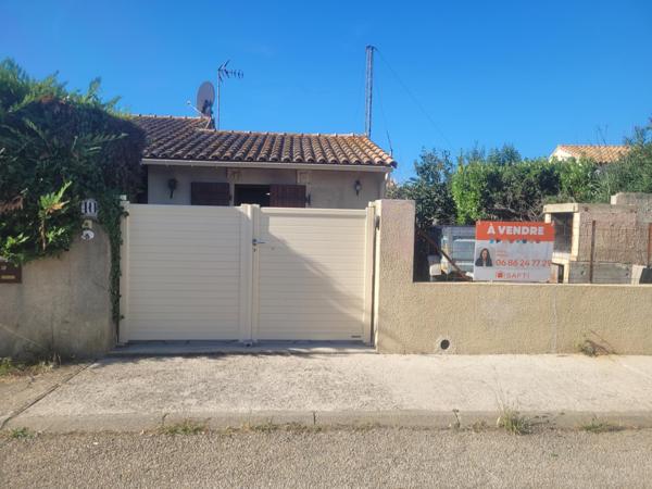 Saint Laurent d'Aigouze, Maison de 78 m2 3 pièces jardin et garage.
