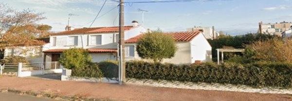 Maison à rafraîchir avec garage et terrain clos