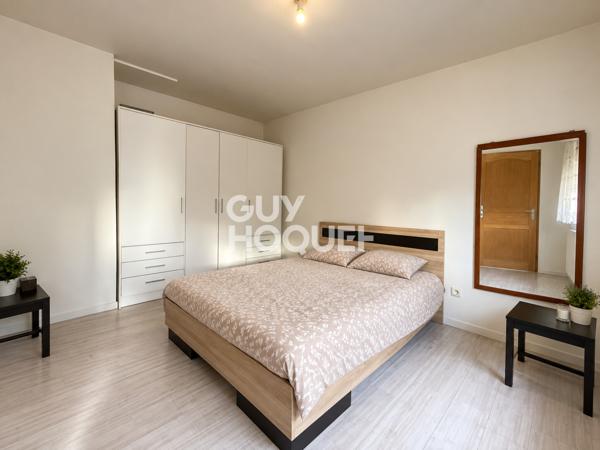 Immeuble de rapport – 2 logements + 2 locaux commerciaux
