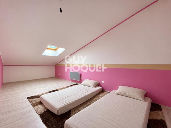 Immeuble de rapport – 2 logements + 2 locaux commerciaux