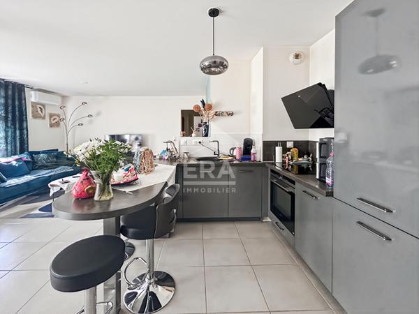Appartement avec terrasse et jardinet places de parking souterraines